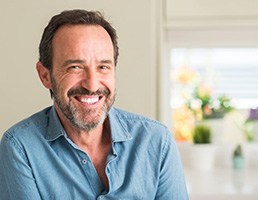 a man in Aspen Hill smiling with dentures